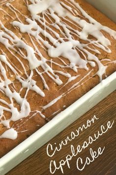 a close up of a cake in a pan with icing