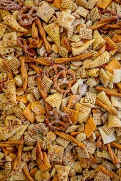 cheesy crackers and pretzels in a casserole dish, ready to be eaten