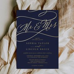 an elegant navy and gold wedding card with the word mr and mrs written on it