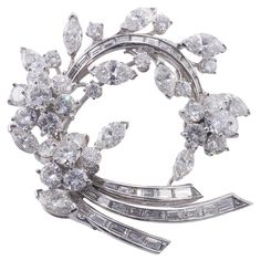 Impressive Midcentury platinum brooch, featuring mixed cut diamonds, including baguette, marquise and round - total approx. 10 carats, SI1/H-I. Brooch measures 1 5/8" x 1 5/8". Not hallmarked. Weight of the piece - 21.1 grams. Van Clef, Van Cleef Arpels Diamond, Diamond Flower Brooch, Diamond Knot, Marquise Shape Diamond, Jewelry Designing, Van Cleef And Arpels, Jewelry Diamonds, Jewelry Brooch