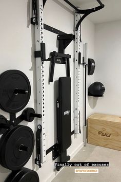 there is a wall mounted gym equipment in the room