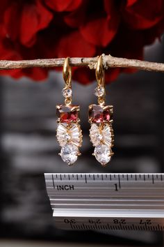 Burgundy bridal earrings Crystal earrings Boho bridal earrings Long vintage earrings 1920s art jewelry Flower girl earrings Wedding jewelry Burgundy drop earrings Cute earrings for your special occasion with crystal and small cubic zirconia on the hook and inside the leaves for sparkle. Be irresistible on your special occasion. Metal: Brass, Gold, Silver If you want to change the colors of the pendant or change the design to your liking, just contact me and together we will create a masterpiece Burgundy Earrings, Romantic Earrings, Bracelet Tennis, Crystal Bridal Earrings, 1920s Art, Flower Girl Gifts, Art Deco Earrings, Wedding Jewelry Earrings, Bow Earrings