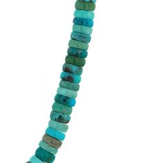 a rippling waterfall of premium qualify Kingman Turquoise rondelle beads this magnificent beaded Navajo waterfall necklace is nothing short of breathtaking strung by Navajo master bead artist Berlinda Begay metaphysical properties of Turquoise: it is said that Turquoise helps with healing maladies of the ears, nose, throat. larynx and neck. This is the stone for ENT Doctors, speech therapists, vocal coaches, singers, auctioneers, radio and television hosts. It helps oxygenate the blood and incre Turquoise Single Strand Necklace With Round Heishi Beads, Turquoise Necklace With Single Strand Heishi Beads, Turquoise Heishi Beads Necklace In Single Strand, Turquoise Heishi Bead Necklace Single Strand, Hand-strung Turquoise Heishi Beads Necklace, Turquoise Rondelle Beaded Necklaces, Waterfall Necklace, Odd Numbers, Silver Lake