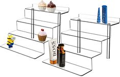 three shelves with different items on them and one has a cupcake in the middle