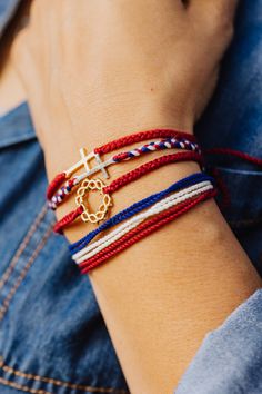 Calling all patriots, we have a multi-cord bracelet that’s perfect for you. Keep it simple and wear the hand-braided peaceful red, white, and blue cotton cord bracelet on its own, or stack it up and layer with the Red Crown of Thorns and We Trust In God bracelets for the ultimate statement stack. For every M4M bracelet sold, Rizen will donate 10% of the purchase price to Christian Ministries. Red Jewelry For Friendship On 4th Of July, Adjustable Friendship Bracelets For 4th Of July, Cotton Cord Bracelet, Red Crown, Faith Jewelry, Crown Of Thorns, Meaningful Jewelry, Cross Bracelet, Christian Jewelry