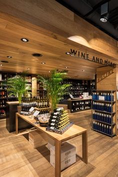 the inside of a wine store with many bottles