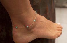 Gold turquoise anklet, simple turquoise ankle bracelet with 3mm beads. A bohemian piece for summer and beach activities. ★Details Material: yellow/rose gold filled or sterling silver Gemstones: turquoise beads Measurements: approx. 3mm (Other gemstones are available as well.) Larger and smaller lengths are available as well. Please contact us before purchase. ------------------------------------------------------------------------------ This piece can also be made in solid gold. Please contact u Elegant Turquoise Anklets For Summer, Elegant Turquoise Anklets For The Beach, Dainty Summer Anklets, Adjustable Turquoise Dainty Anklets, Dainty Adjustable Turquoise Anklets, Minimalist Turquoise Jewelry For Summer, Turquoise Ankle Bracelet, Turquoise Anklet, Bead Anklet