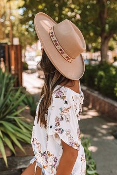 Our pretty taupe hued 'Girlfriend Status' fedora featuring lightweight wool material, a curved 4-inch brim, and a floral embroidered accent band! Hat Dimensions: Length - 15.5 Inches Width - 14 Inches Height - 4.5 Inches Cranial Circumference - 22 Inches Wool Fedora, Mocha, Fedora, 4 Inch, Wool, Band, Hats, Floral