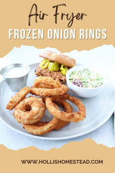 a plate with onion rings and coleslaw on it