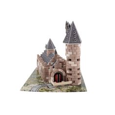 a paper model of a castle with turrets