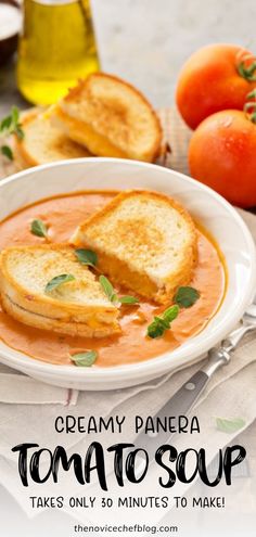 creamy panera tomato soup with toasted bread on top and tomatoes in the background