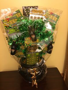 a gift basket that includes beer, chocolates and other items for st patrick's day