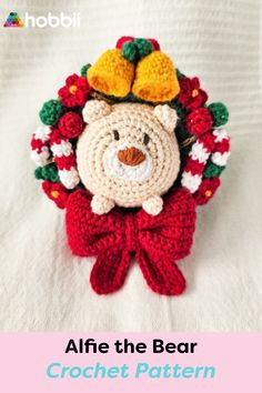 a crocheted teddy bear wearing a christmas wreath with bells on its head and the words, after the bear crochet pattern