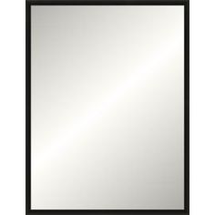 a large black framed mirror on a white wall with a black border around the edges