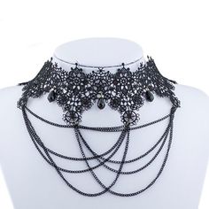 This Gothic Choker Is Made Of Black Lace Accented With Dramatic Dangling Black Chains. The Necklace Closes In The Back With A Lobster Clasp. The Chain Is Adjustable To 13-15.5". Black Punk Clavicle Chain Necklace, Black Punk Jewelry With Chain, Black Punk Style Jewelry With Chain, Punk Style Black Chain Jewelry, Edgy Black Chain Necklace For Party, Vintage Black Metal Chain Necklace, Vintage Black Chain Necklace For Party, Black Metal Choker For Party, Black Punk Necklace For Party