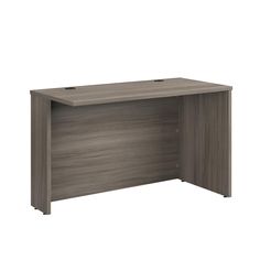 an office desk with two drawers and one door on the right side, in grey oak