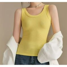 Tank Lightweight Ribbed Material Scoop Neckline Tank Straps Pull On/Off Style Model Wearing Dark Grey Color Available Yellow Material: 100 Polyester Medium Length From Strap: 18.5 Length From Neckline: 14.5 Bust: 26 Waist 24 Large Length From Strap: 20 Length From Neckline: 15.5 Bust: 28 Waist 26 Xl Length From Strap: 21.5 Length From Neckline: 16.5 Bust: 31 Waist 29 Condition: New Without Tags Affordable Fitted Mango Tops, Woman Vest, Outer Women, Cotton Crop Top, Off Shoulder Crop Top, Sleeves Clothing, Bottoming Shirt, Basic Shirts, Shoulder Crop Top