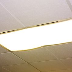 an overhead light fixture on the ceiling