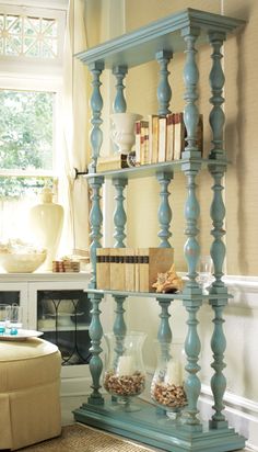 a blue book shelf in a living room