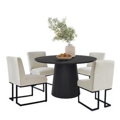 a black table with four white chairs around it