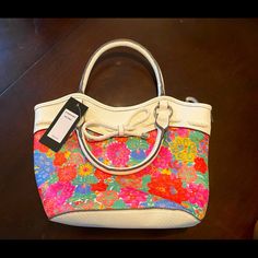 Beautiful Floral Summer Or Spring Purse. Brand New With Tags Comfortable To Hold. Looks Very High End. Casual White Bag For Spring, Multicolor Bags For Day Out In Spring, Floral Print Bags For Summer Day Out, Summer Floral Print Bags For Day Out, Summer Floral Print Bag For Day Out, Summer Floral Print Day Out Bag, Casual White Bag With Floral Print, White Floral Print Shopping Bag, Casual White Floral Print Bag