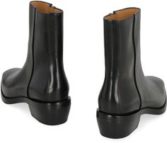 Step out in style and make a statement with these stunning ankle boots. Crafted from luxurious calf leather, these boots exude sophistication and class. The internal side zippered closure ensures a perfect fit, while the square toeline adds a modern touch to the design. Whether you're dressing up for a night out or adding a chic edge to your everyday look, these 100% calf leather boots are the perfect choice for any fashion-forward individual. Elevate your wardrobe with these timeless ankle boot Calf Leather Boots, Ankle Boots Men, Black Leather Ankle Boots, Leather Cap, Sneaker Heels, Black Ankle Boots, Leather Ankle Boots, Lanvin, Mens Shoes Sneakers