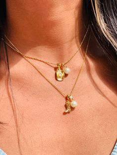 "The ultimate gift necklace for the Coastal or Western cowgirl. 2mm Gold Filled beaded necklace or Cable chain with your choice of a cowgirl boot or hat charm with a pearl. Material: 18 Karat Gold Filled, Hypoallergenic. Tarnish Resistant. Gold-filled does not de-laminate or peel like Gold plated Jewelry nor does it tarnish as readily as silver. Generally speaking, gold filled is better quality and will have a much longer lasting color than plated jewelry. We recommend keeping abrasive chemicals Western Jewelry Gold, Cowboy Hat Necklace, Adjustable Charm Necklace With Pearl Charm For Everyday, Adjustable Pearl Charm Pendant Necklace, Adjustable Everyday Charm Necklace With Pearl, Western Charm Necklace, Gold Western Jewellery, Coastal Cowgirl Jewelry, Western Gold Jewellery