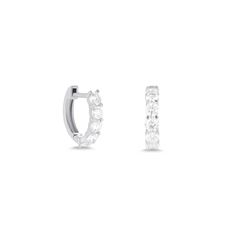 Design Our classic huggie style with extra large diamonds. To be worn when you're feelin' extra. Details & Dimensions - 0.70 carats (pair), 0.35 carats (single)- Exterior Measurements: 11mm width, 9.5mm height- Interior Measurements: 6.5mm width, 7mm height Linking Rings, Solitaire Necklaces, Domed Ring, Tennis Bracelet Diamond, Fine Jewelry Designers, Pinky Ring, Diamond Bracelets, Chain Earrings, Huggies Earrings