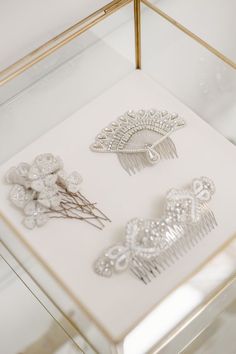 three different types of hair combs on display