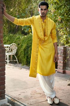 Featuring a haldi yellow kurta in linen cotton silk base with mirror machine embroidery. It is paired with contrasting salwar pants and a stole. . #perniaspopupshopmen #whatiworewastrending #ppuslove #kurtaset #kurtaformen Shaadi Kurta For Men, Haldi Outfits Men, Yellow Kurta Men For Haldi, Men Haldi Outfit, Haldi Kurta For Men, Yellow Kurta Men, Haldi Ceremony Outfit For Men, Mens Traditional Wear, Indian Wedding Clothes For Men