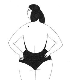 a woman standing in the water with her back to the camera, wearing a black swimsuit