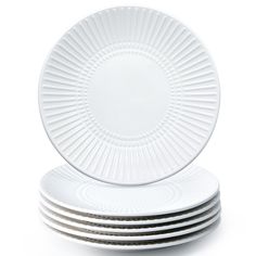 white plates stacked on top of each other