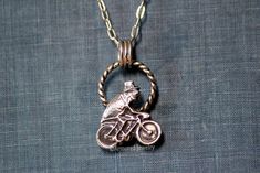 This pendant is made from recycled sterling silver. It is handmade from start to finish. It features a quirky flea on a bicycle. The pendant measures about 1" tall x 11/16" wide, including the loops at the top. You can choose to buy the pendant alone or with a chain in your choice of length. © Armored Jewelry. All rights reserved. By purchasing from my shop, you agree to the Armored Jewelry policies: http://www.etsy.com/shop/ArmoredJewelry/policy?ref=shopinfo_policies_leftnav Insect Jewelry, Unique Birthday Gifts, Recycled Sterling Silver, Jewelry Silver, Taxidermy, Circus, Jewelry Necklace Pendant, Etsy Accessories, Unique Gifts