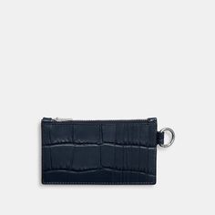 Crafted of distinctive crocodile-embossed leather detailed with our tonal Signature hardware this case unzips to reveal an expandable pocket. A slim design that slips easily into pockets it holds five cards and other small essentials. Clip it to a bag or secure to a set of keys with the attached D-ring. | Coach Zip Card Case - Dark Navy Rectangular Business Wallet With Interior Key Chain Holder, Coach Rectangular Card Holder With Coin Pocket, Classic Coach Card Holder For Travel, Luxury Coach Card Holder With Card Slots, Coach Travel Card Holder, Elegant Coach Leather Card Holder, Coach Wallet With Coin Pocket, Classic Coach Card Holder For Everyday Use, Coach Rectangular Wallet With Coin Pocket