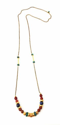 Beautiful throw on necklace.  Made of gold plated accents with jade, jasper, turquoise and gold plated chain. 30 inches with no clasp. Gold Turquoise Necklace With Beaded Chain As Gift, Turquoise And Gold, Gold Plated Chains, Tassel Necklace, Jade, Gold Plate, Beaded Necklace, Plating, Turquoise