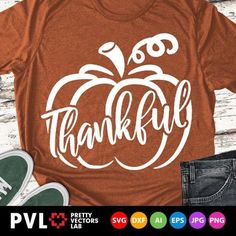 a t - shirt with the words, thank you and an orange pumpkin on it