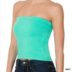 Cotton Crop Top Tube Top With Built-In Bra Fabric: 95% Cotton, 5% Spandex. The Fabric Has Stretch In It And Hugs Your Body. Total Body Length: 12.25", Bust: 27" - Measured From Small. Add 2" For Each Up Size Available In Sizes Small, Medium, Large And Extra Large Color: Mint. Perfect Cool Color For Summer Crop Top Green Stretch Tube Top With Built-in Bra, Casual Blue Bandeau Tank Top, Trendy Strapless Elastane Tops, Blue Fitted Bandeau Tank Top, Blue Bandeau Tank Top For Spring, Fitted Tube Top For Spring, Fitted Solid Color Tube Top For Spring, Casual Strapless Elastane Top, Fitted Blue Bandeau Tank Top