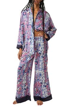 Make bedtime a bit more boho in flowery pajamas that live up to their dreamy designation. 28 1/2" to 31" top length; 28" inseam; 32" leg opening; 14" front rise; 17" back rise (size Medium) Top has spread collar; long sleeves 100% polyester Hand wash, line dry Imported