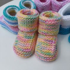 Beautiful Hand Knitted Babies Booties These has been lovingly hand knitted in baby soft dk yarn. Knitted in a variety of colours with more to come these baby booties will make the perfect gift for your baby or an expectant mother.  Featuring a long sock like top which can be left up or folded down. Suitable for babies 0 - 3 months as a guide. Many more colours to come and we also accept custom orders :) Cute Yarn Booties As A Gift, Yarn Booties With Round Toe As Gift, Cute Yarn Booties As Gift, Yarn Booties With Round Toe For Gift, Knitted Round Toe Booties As Gift, Cute Knitted Round Toe Booties, Cute Knitted Booties As Gift, Newborn Knitted Shoes, Crochet Yarn Booties As Gift