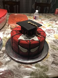 a cake with a spiderman design on it