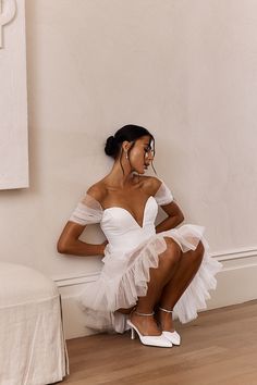 Off-shoulder Prom Dress With Corset Back, Chic Off-shoulder Mini Dress For Homecoming, Backless Mini Dress With Corset Back For Bridesmaids, Ruffled Dress For Bachelorette Party, Backless Mini Dress With Corset Back For Wedding, Off-shoulder Mini Dress With Fitted Bodice For Prom, Wedding Backless Mini Dress With Corset Back, Wedding Mini Dress With Corset Back And Backless Design, Backless Mini Dress For Bridesmaids And Prom