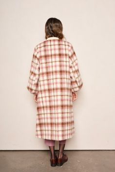 The Cameron coat adds a modern, feminine twist on the elemental bomber. Outfitted in a classic blush Plaid wool, this silhouette features exaggerated bishop sleeves, metal snap buttons, front patch pockets and classic rib trim. The perfect long coat to compliment your autumn ensemble. Our Model Kristi is 5’8 and wearing a XS. She normally wears XS, 26, or 0. Modern Feminine, Denim Jumpsuit, Wool Plaid, Winter Sale, Long Coat, Skirt Pants, Short Pants, Sweater Top, Jumpsuit Romper