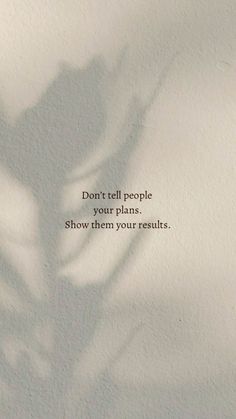 the shadow of a plant on a wall with a quote written below it that reads, don't tell people your plans show them your results