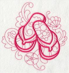 an embroidered design on white paper with red thread in the center and two hearts at the bottom