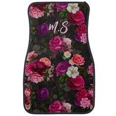 pink and purple flowers with the letter m s on black floor mats for car or truck