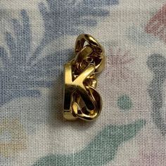 Lovely Bottega Veneta Ring! Comes With Original Case Which May Have Dirt/Dust Or Stain Marks. Back Side Of The Ring Has The Size And Serial Number. Ring Was Worn A Few Times And Shows Signs Of Age/Wear. We’re Not Sure If The Ring Is Made Of Actual Gold. Please Be Sure To View All Photos! May Consider Offers. Number Ring, Letter K, Bottega Veneta, Gold Color, In Italy, Stain, Women Accessories, Italy, Signs