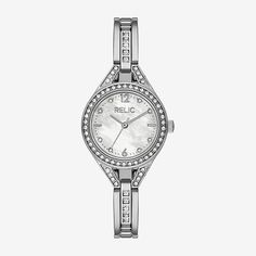 Add a feminine touch to your look with this Relic by Fossil evalyn three-hand silver-tone watch. It features a 27mm round case with a white mother of pearl dial and a jewelry bracelet with square shaped stones.Number of Batteries: 1Included: 1 Watch(es)Features: Quick ShipBattery Type: Lithium IonJewelry Closure: Fold Over ClaspPower Source: Battery (included)Watch Movement: QuartzWater Resistance: 30mBand Color: Silver ToneDial Color: Mother of PearlMetal Color: Silver ToneCase Thickness: 8mmCa Silver Watch Women, Silver Watches Women, Three Hands, Jewelry Bracelet, Watch Movement, Fold Over, Silver Watch, Jewellery And Watches, Mother Of Pearl