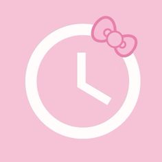 a pink clock with a bow on it