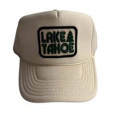 Lake Tahoe Trucker Hat From the mountains to the slopes! This his or hers trucker is part of our Timeless Traveler Collection. Cute and perfect for your next day in the sun. So light, medium profile and a perfect addition to your growing hat collection. 5 Panel Foam Mesh Back Trucker, Pro Style Adult Sizing 100% Poly Foam Front, 100% Nylon Back Trucker Snapback Hat For Travel, Snapback Trucker Hat For Travel, Trucker Hat With Curved Brim For Travel, Curved Brim Trucker Hat For Travel, Trucker Style Hat With Curved Brim For Travel, Adjustable White Baseball Cap For Outdoor, Retro Summer Trucker Hat For Outdoor, Trucker Baseball Cap For Travel, Travel Trucker Hat With Flat Bill