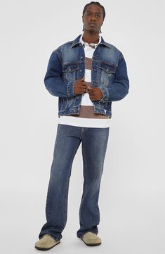 A timeless layer for your casual wardrobe, this denim trucker jacket features lived-in fading and the iconic Guess logo patch at the hem. Front button closure Spread collar Button cuffs Chest button-flap patch pockets; front slant pockets 100% cotton Machine wash, tumble dry Imported Classic Medium Wash Rigid Denim Jacket, Casual Selvedge Denim Jacket In Denim Blue, Casual Denim Blue Rigid Denim Jacket, Selvedge Denim Jacket For Streetwear, Casual Rigid Denim Jacket In Denim Blue, Casual Selvedge Denim Jacket In Relaxed Fit, Casual Selvedge Denim Jacket For Streetwear, Casual Medium Wash Rigid Denim Outerwear, Casual Medium Wash Rigid Denim Jacket